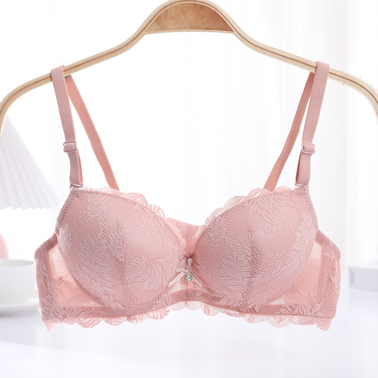 Fábrica de stock pequeño pecho grueso sujetador sexy encaje reunido ropa interior de mujer con anillo de acero sobre el bra de caída
