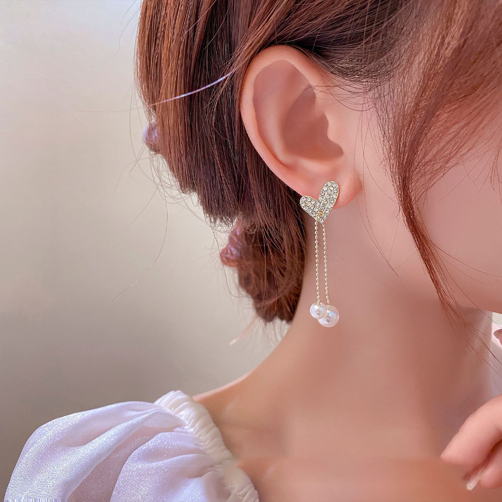 Pendientes largos con flecos elegantes y diamantes con aguja de plata Pendientes de todo fósforo de temperamento de nicho Pendientes simples y ligeros de lujo de alta gama Mujeres