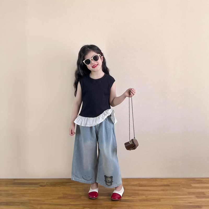 2025 Girls Summer Sweet Style Black Ruffle Sleeveless Patchwork T-Shirt Vest + Smiling Bear Wide Leg Jeans 2025 Girls Summer Sweet Style Black Ruffle Sleeveless Patchwork T-Shirt Vest + Smiling Bear Wide Leg Jeans