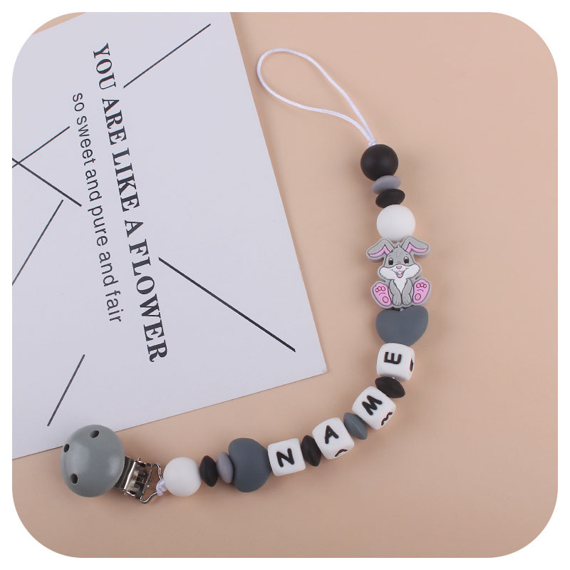 El Comercio exterior nueva cadena de chupete de conejo de silicona suministros para bebés personalizable nombre del bebé cadena anti-caída