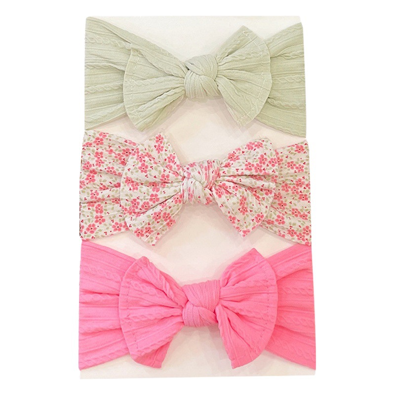 Europa y América suave Jacquard de ala ancha bowknot diadema elástica 3 piezas traje infantil halógena puerta impresa pañuelo en la cabeza de nylon