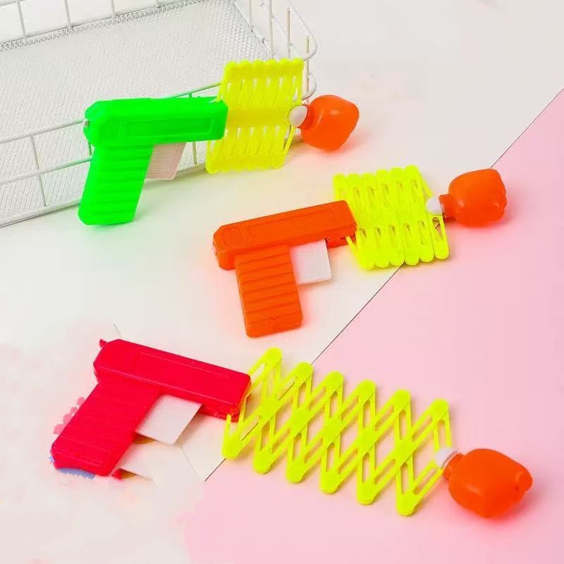 Juguetes para niños, puños retráctiles, accesorios para toda la persona, pequeños obsequios, premios, rompecabezas, puestos nostálgicos, grandes almacenes de 2 yuanes al por mayor