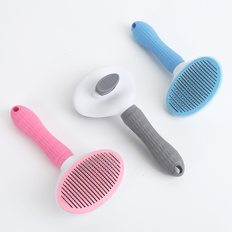 Peine transfronterizo de depilación con un solo clic Peine para mascotas Peine de depilación para gatos Peine de depilación automática Peine de perro de belleza Suministros de cepillo