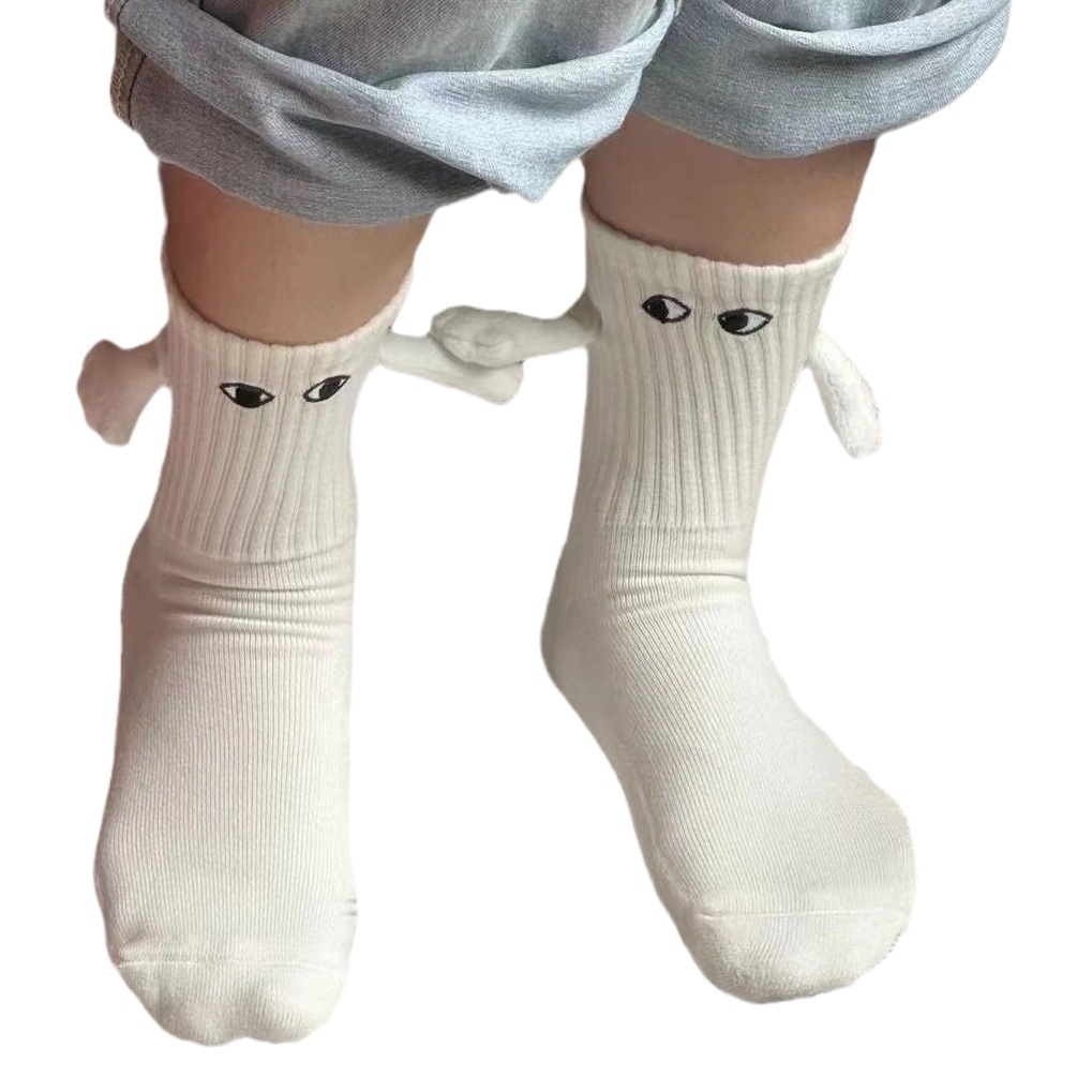 Calcetines de mano de cara sonriente transfronteriza calcetines de media pantorrilla hombres y mujeres de moda pareja magnética personalizada calcetines de mano calcetines de estudiante en blanco y negro