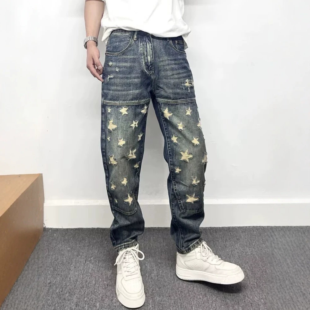 Chegaralararo Amerika kundalik, o'tkir uslubdagi patchwork retro yirtilgan jinsi shimlar erkaklar uchun zamonaviy brend shaxsiylashtirilgan, qiynalgan tor jinsi shimlar