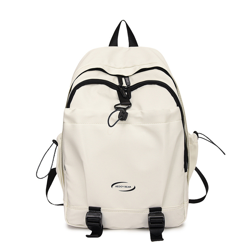 Nuevo estilo coreano transfronterizo de color sólido simple y versátil para estudiantes de escuela primaria y secundaria de alta capacidad mochila de viaje