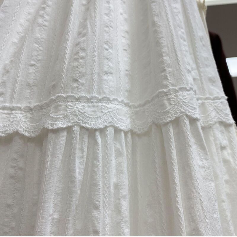 新商品のケーキ層の刺繍レースは半身のスカートの女性2025早春のフランス式の小さい衆の白い半身の長いスカートをつなぎ合わせます。|undefined