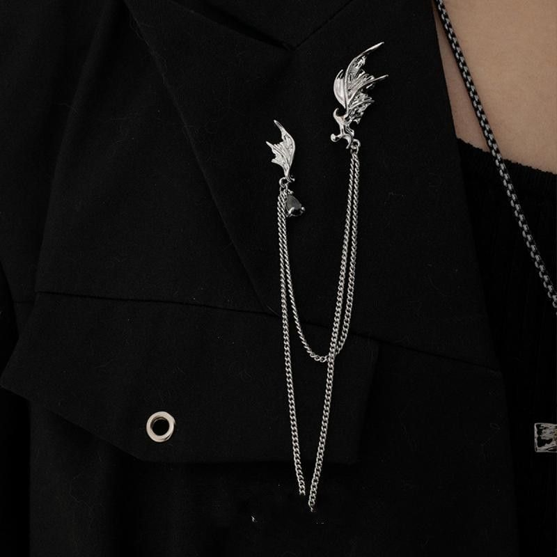 Brooch with tassels
