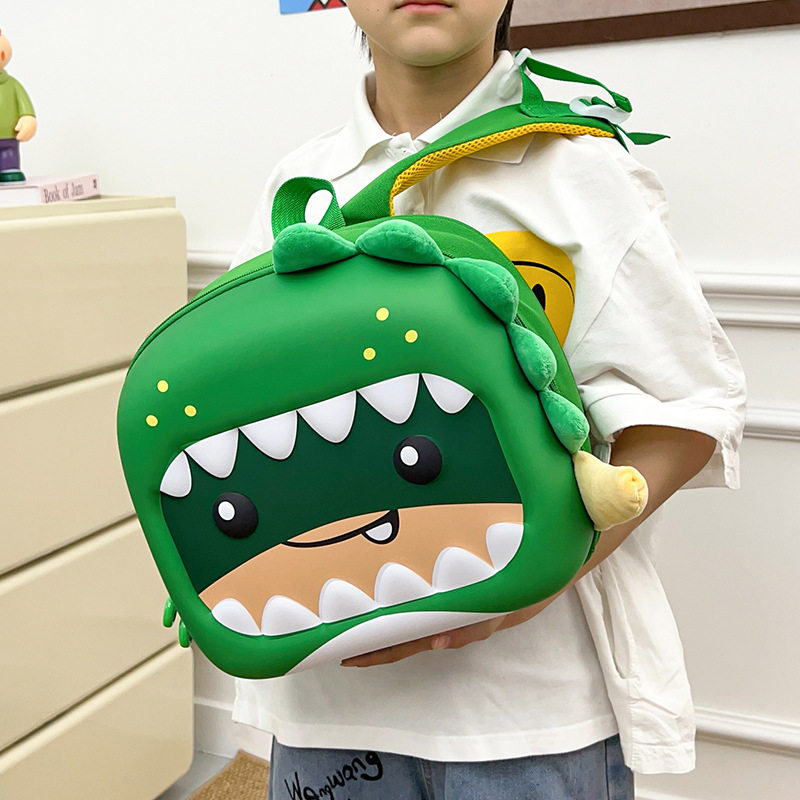Mochila de dibujos animados lindo pequeño dinosaurio para niños y niñas cáscara de huevo ligera mochila para bebé de jardín de infantes nueva mochila para niños