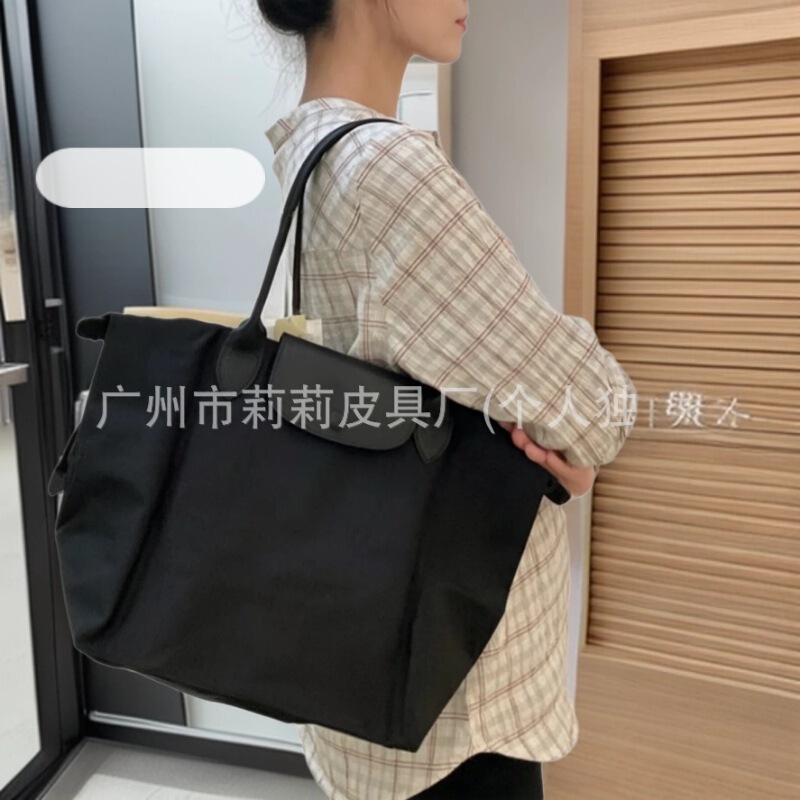 High-Quality New Model of the French Longchamp Medium-Sized Long-Handle Tote Bag, Lightweight, Waterproof, Foldable, Suitable for Commuting, Handbag, Shoulder Bag, Dumpling Bag High-Quality New Model of the French Longchamp Medium-Sized Long-Handle Tote Bag, Lightweight, Waterproof, Foldable, Suitable for Commuting, Handbag, Shoulder Bag, Dumpling Bag