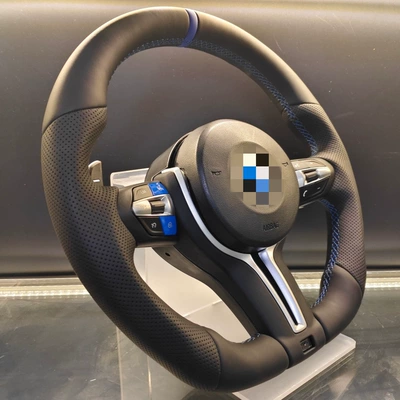 blue button-stitched T-shaped steering wheel assembly, Steering wheel