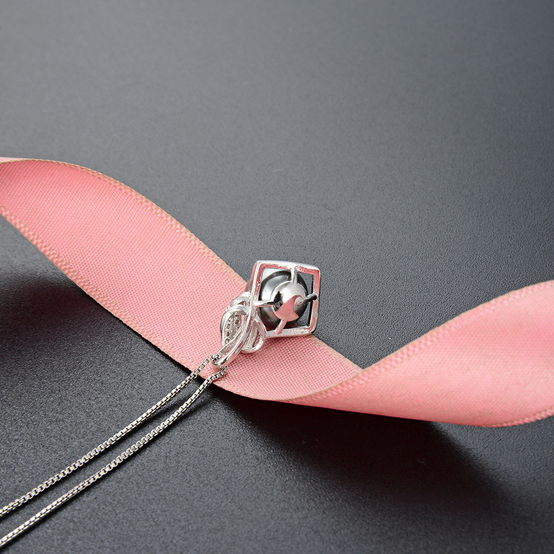 Europa y América simple nicho personalizado collar de cadena clavícula perla S925 plata estilo frío con incrustaciones colgante femenino al por mayor