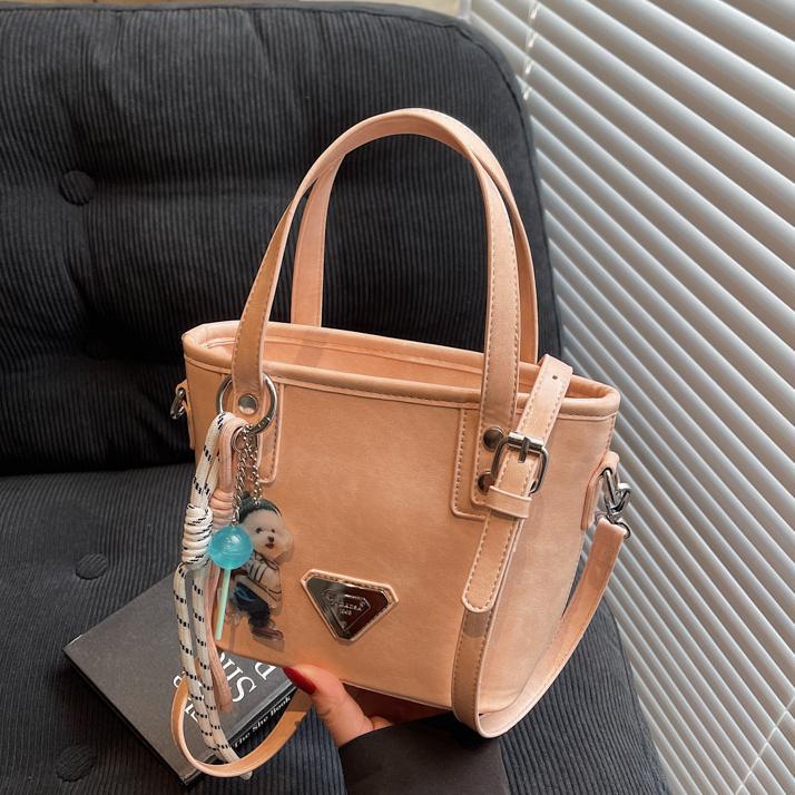 Paquete portátil de cuero de cera de aceite de alta calidad para mujeres 2025 nuevo estilo coreano bolso de hombro de estilo extranjero bolso retro versátil