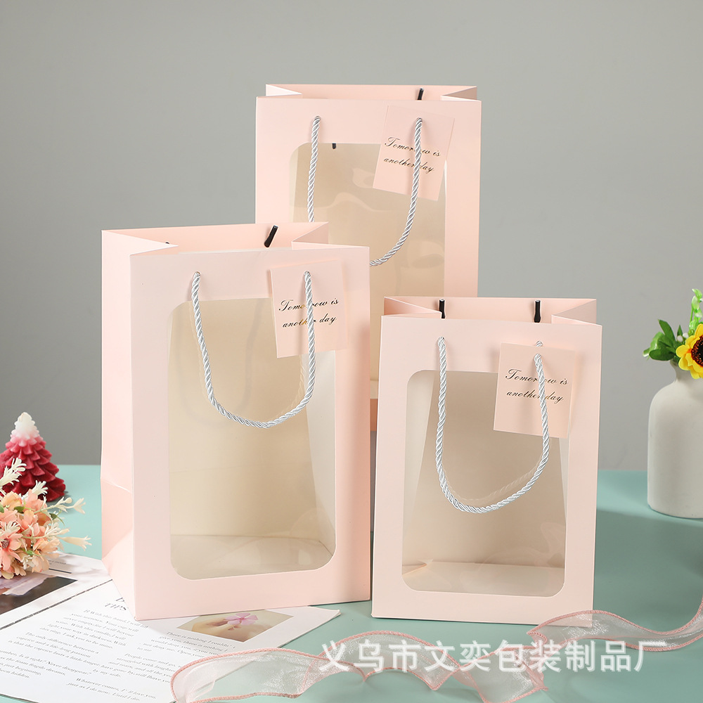 Bolsa de regalo transparente al por mayor de fábrica Bolsa de regalo de flores del festival Qixi Bolsa de regalo de regalo de ventana abierta Bolsa de regalo portátil