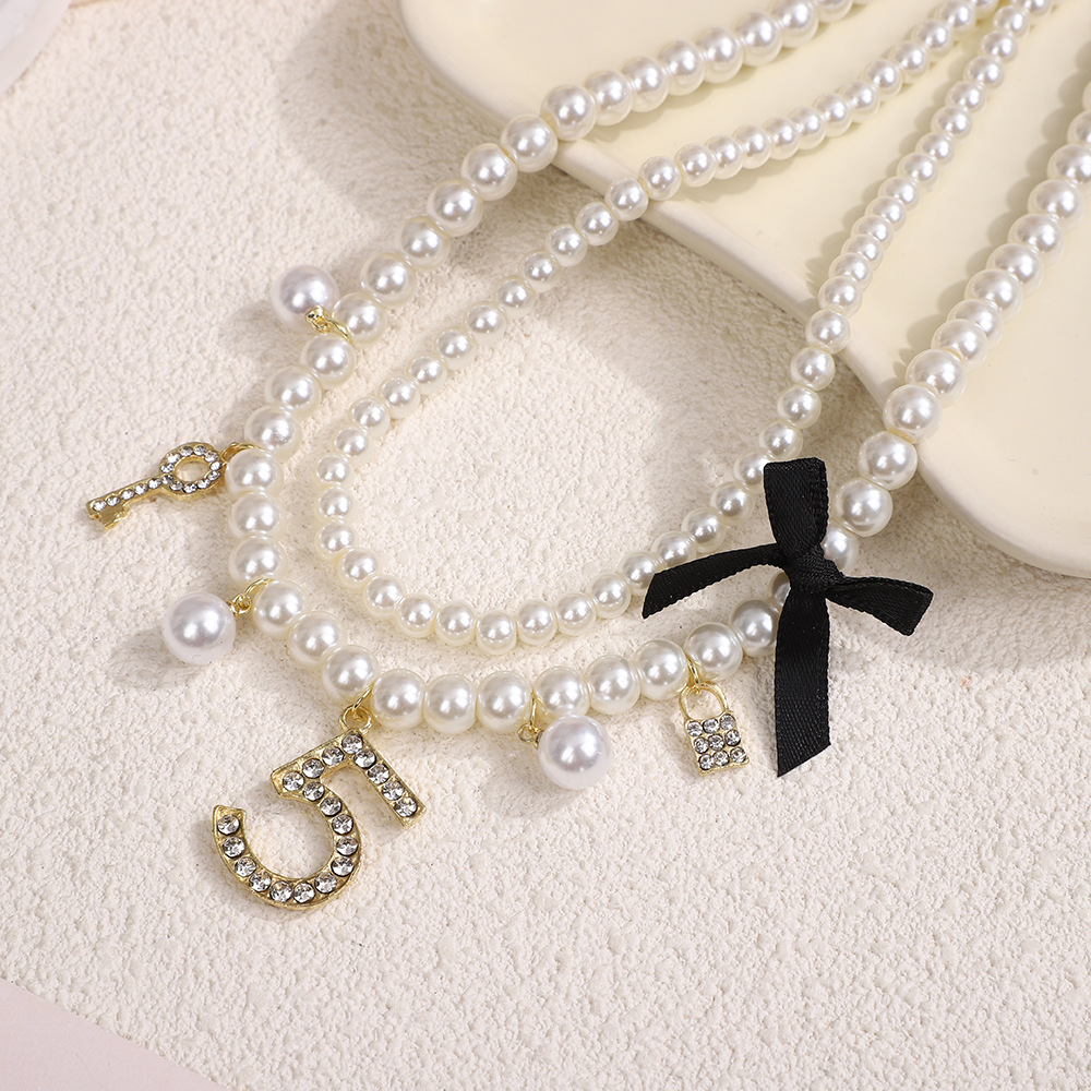 Collier NK-295 Noir à double rang de perles, court, haut de gamme, léger et luxueux, pour femme. Nouvelle chaîne clavicule._voghion.com