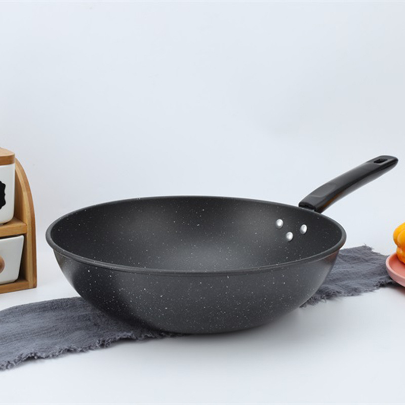 Suministro directo de fábrica de hierro wok hogar no recubierto sartén antiadherente Cocina de Inducción estufa de gas aplicable al por mayor