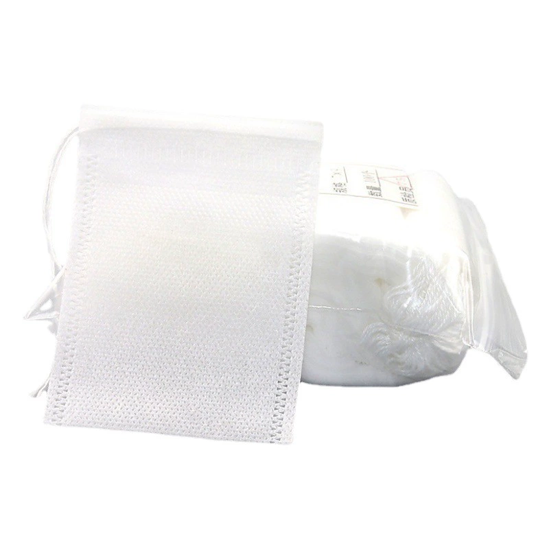 Белый нетканый материал шнурок пустой мешок фильтра мешка Саше мешок ювелирных изделий упаковывая мешок подарка оптовой продукции