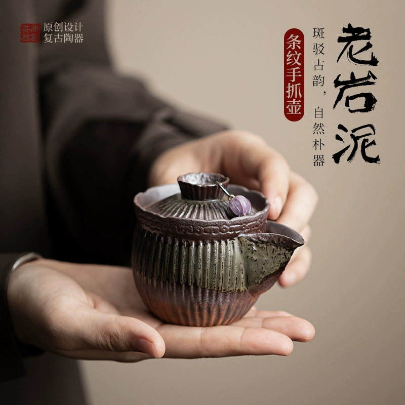 Старый каменный глиняный полосатый ручной захват горшок ретро керамический чайник ручной работы