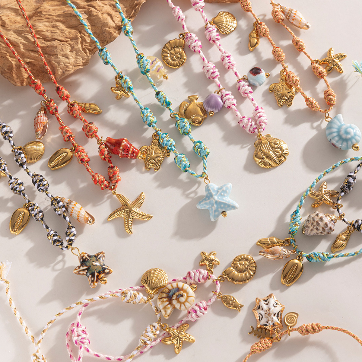 Tena nueva colección de océano creativo pulsera de acero inoxidable para niñas caracol de cerámica colgante de acero de titanio joyería de mano de concha