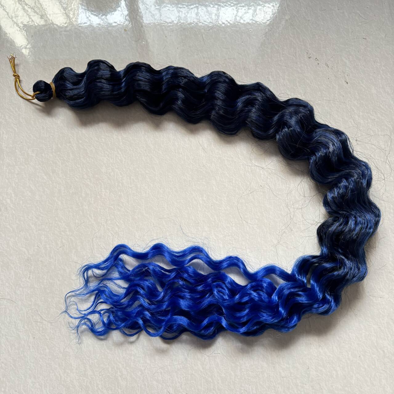 Pequeño pelo de onda profunda 22 pulgadas de fibra química crochet pelo 100G rollo africano trenza sucia manija del pelo transfronteriza