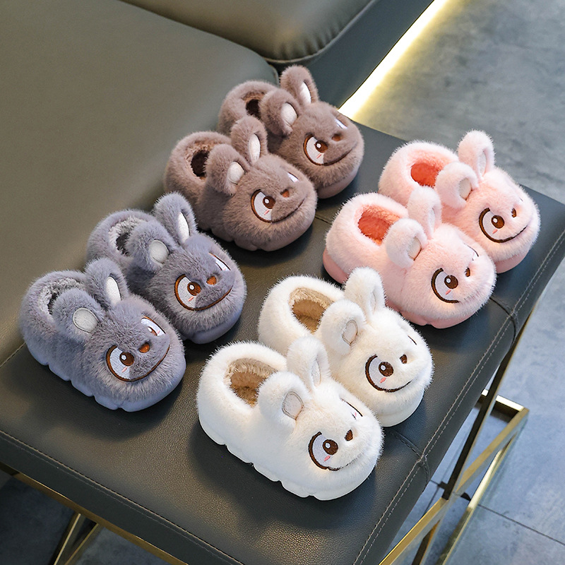 Otoño y invierno zapatillas de algodón para niños y niñas calientes y pelusa para padres e hijos antideslizantes con suela gruesa bolsas de niños y zapatos de algodón