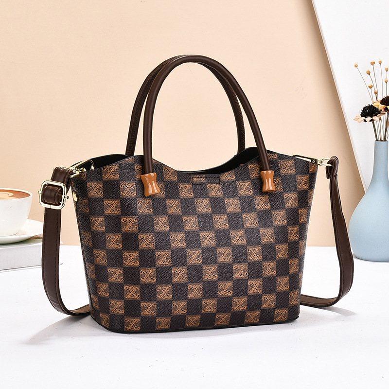 Bolsa de mano, bolsa de hombro de gran capacidad, bolsa de mochila, textura universal, comercio exterior, bolsas de mujer, bolsas transfronterizas de Taizhou