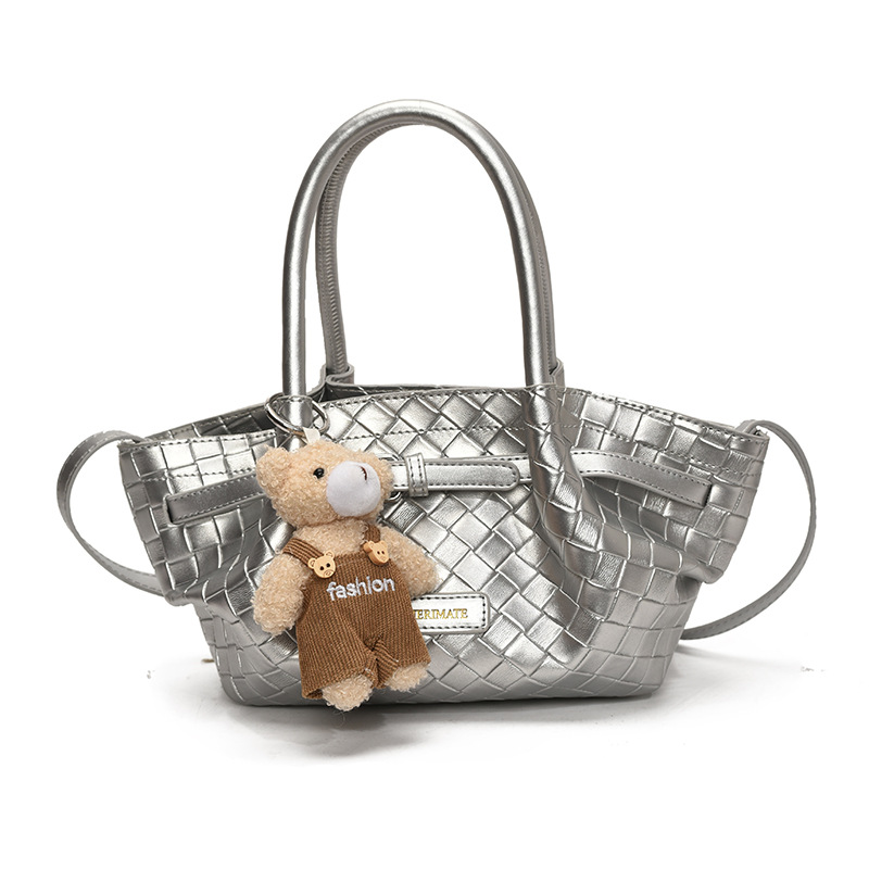 Bolso de cubo de estilo explosivo de moda para mujer 2025 nuevo bolso de hombro de nicho de todo fósforo tejido de estilo occidental bolso de mensajero de mano de moda