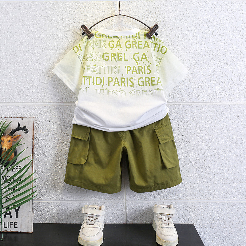 7147 Traje de verano para niños Traje de dos piezas de verano para niños de manga corta casual de Internet rojo bebé de moda de moda nueva 2025