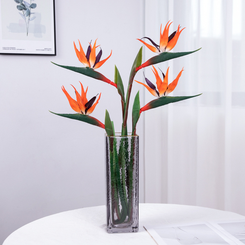 Simulación de pegamento suave ramita pájaro paraíso modelo de decoración para el hogar adornos para la fotografía props de plástico flores falsas al por mayor