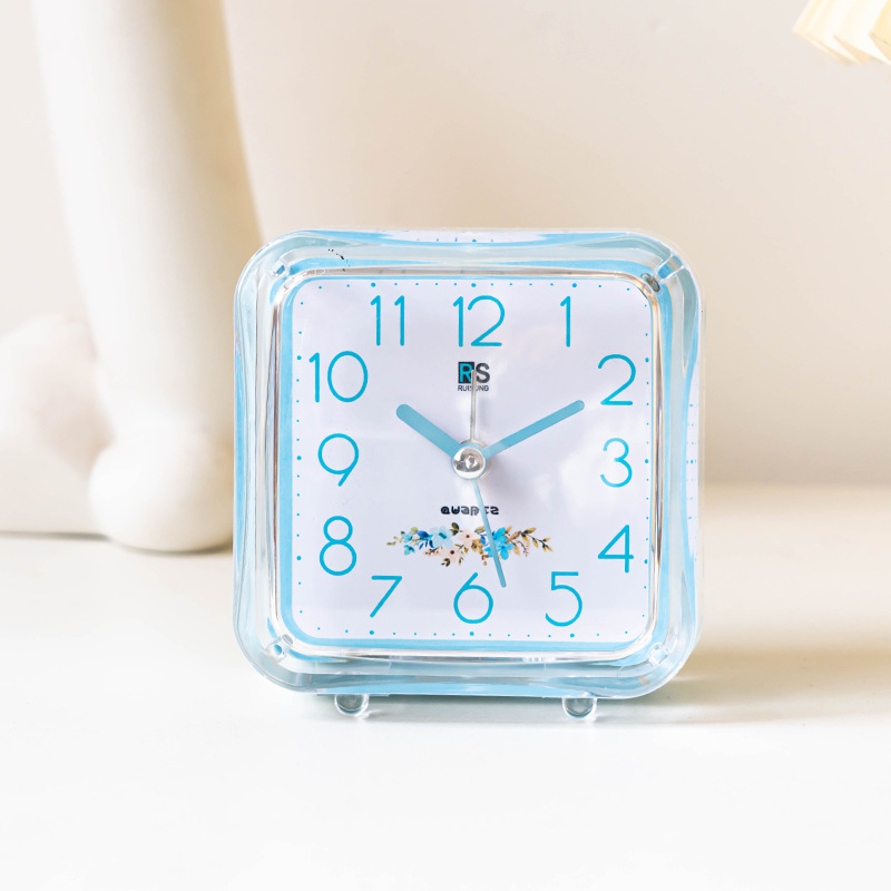 Ventas de fábrica simple reloj de alarma de plástico estudiante reloj de color caramelo con luz de dibujos animados claro fácil de llevar reloj de alarma