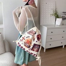 可爱帆布包包女2025新款大容量抽绳双肩包卡通时尚帆布袋一件代发