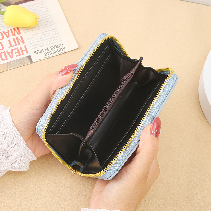 Nueva billetera coreana pequeña billetera de mujeres corta y corta para estudiantes de chicas cremallera cero al por mayor billetera billetera