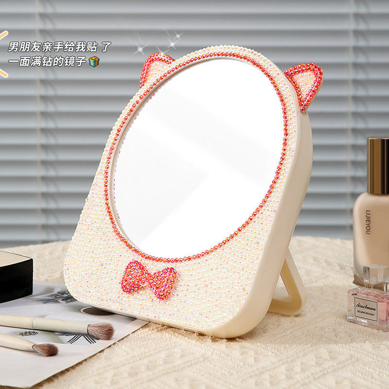 Espejo de maquillaje de escritorio de plástico ins espejo de maquillaje de niña almacén de arco espejo plegable lindo gato oídos espejo