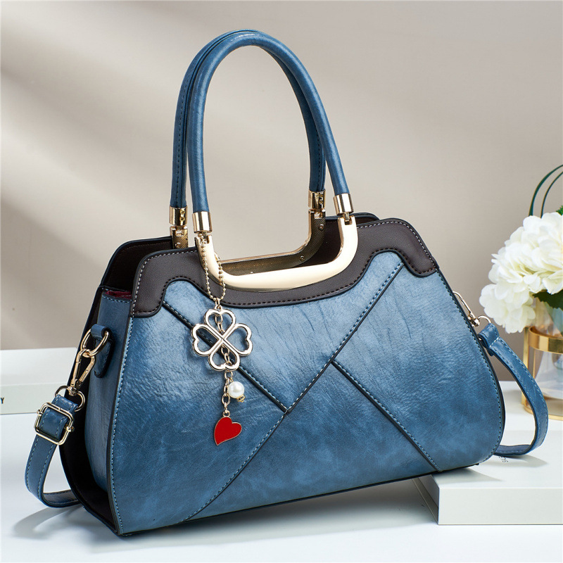 Temperamento sensación de mochila de gran capacidad bolsos de mano versátiles moda simple bolsos de hombro casuales bolsos transfronterizos
