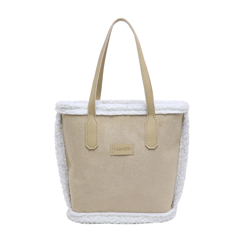 Personalidad de la moda de la axila bolso de cubo de invierno 2024 nuevo estilo casual estilo exterior simple retro hombro bolso de viaje portátil