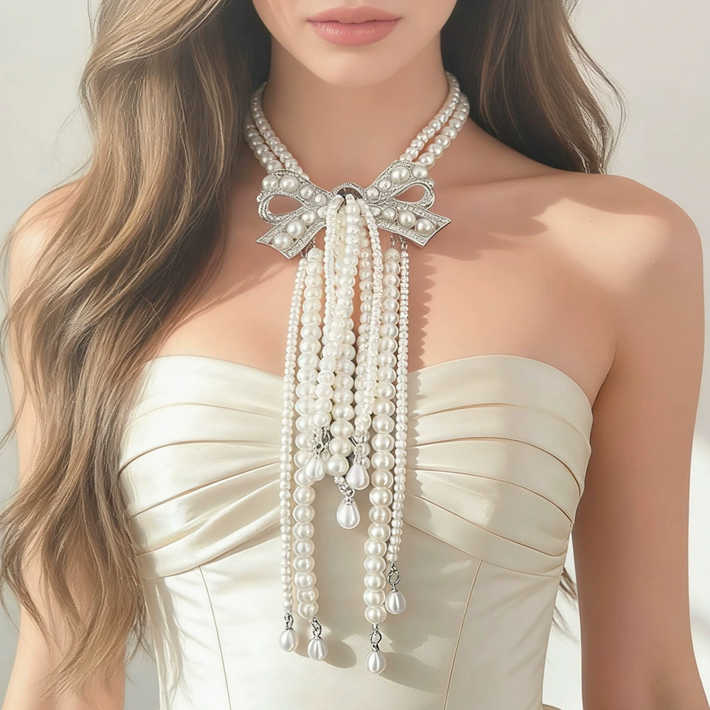 French double-layer glass imitation pearl bow necklace with a high-end and elegant feel, layered alloy rhinestone tassel collarbone chain