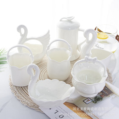 骨磁器の台所のアイデアの白鳥の花のかごのナイフのフォークのかごは小さいスープのスプーンの棚のスプーンの筒の箸のかごのスプーンのかごを置いて印字することができます。