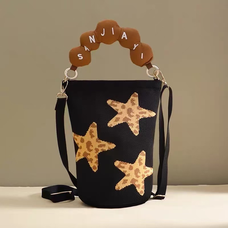 2026 primavera y verano nuevo bolso de cubo de pintura creativo portátil gran espacio de aire de dopamina alta sensación mochila
