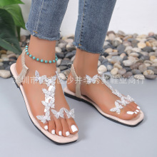 2025夏季新款外贸大码女士欧美风格套脚水钻装饰平底蝴蝶凉鞋女