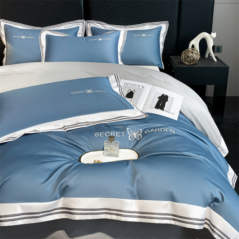 Simple ligero de lujo algodón puro cuatro piezas de sábanas de algodón ropa de cama textil doméstico cuatro estaciones tres piezas de conjunto general