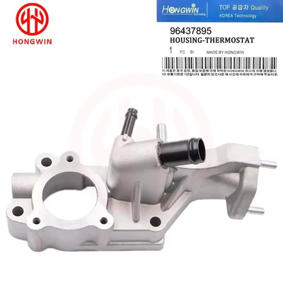 Power supply, ignition system accessories thermostat housing assembly