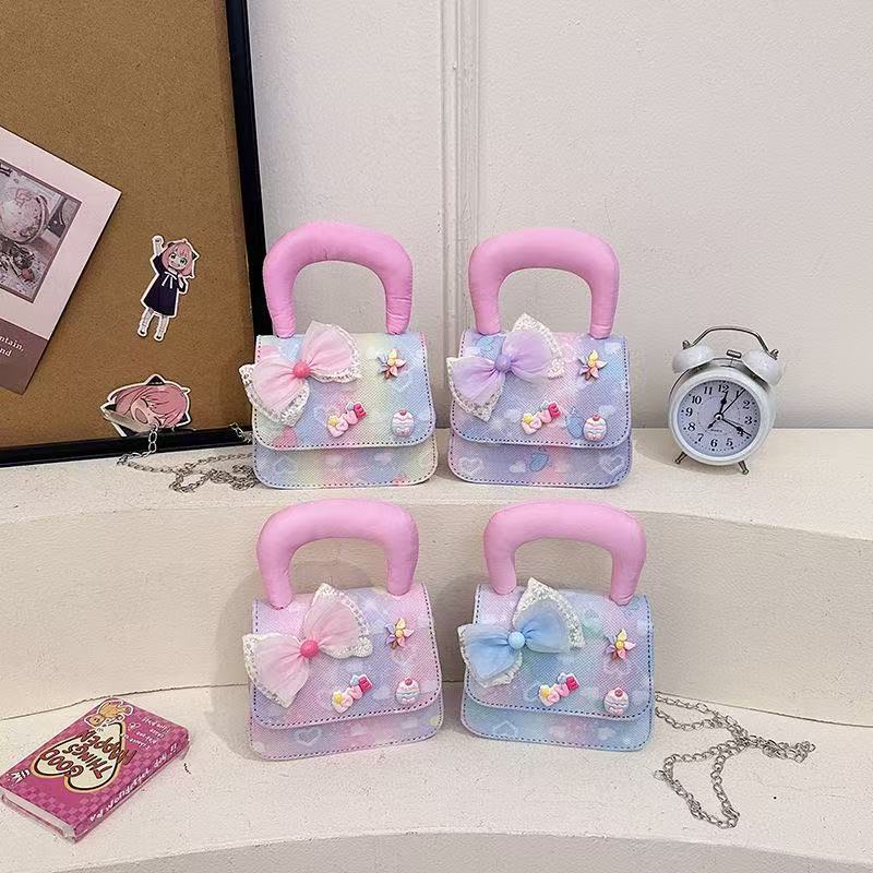 Bolso de niñas regalo de Año Nuevo bolso de hombro para niños 2025, nuevo estilo princesa bolso de mano extranjero gradiente versátil bolso de mochila