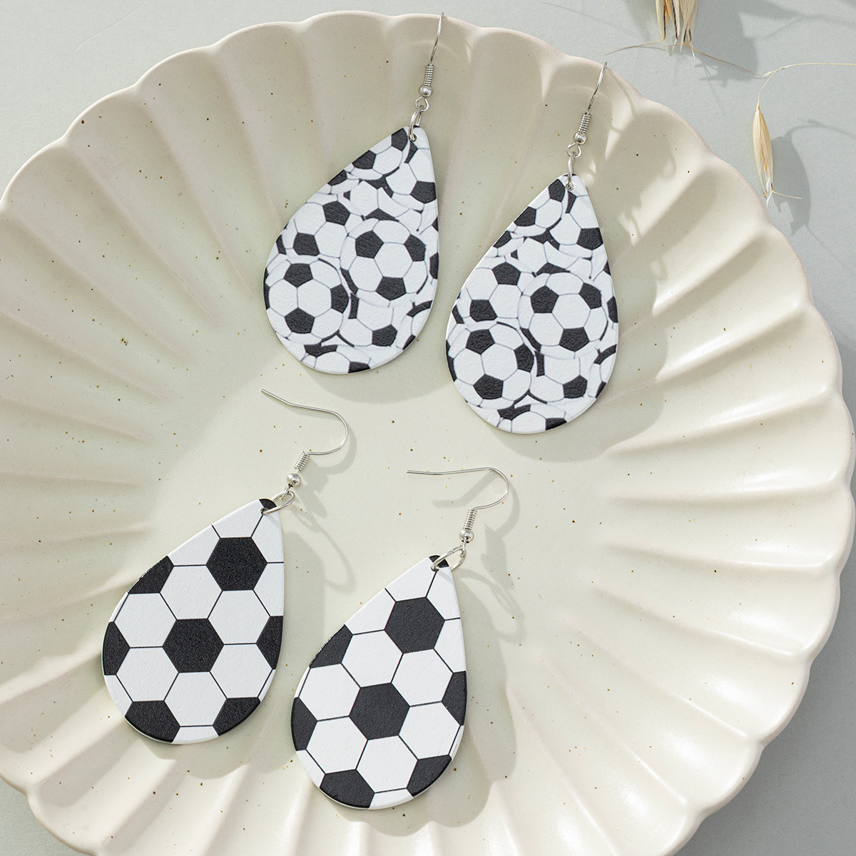 Fashionable wooden football earrings drop-shaped