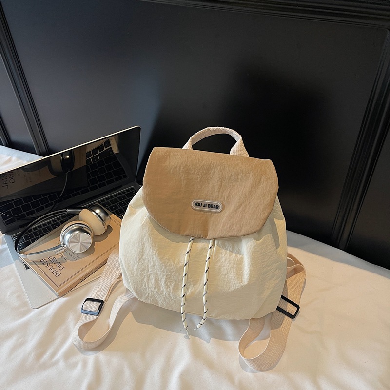 Mochila de moda pequeña mochila casual para mujeres 2025 nueva bolsa de viaje de gran capacidad bolsa de viaje al aire libre