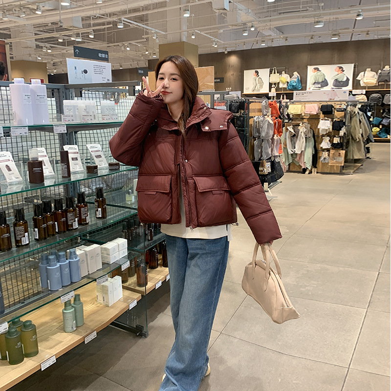 Inventario 2025 nuevo abrigo de algodón de plumón de mujer estilo coreano suelto abrigo de pan corto con capuchón grueso abrigo de invierno image 1