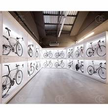 时尚骑行单车展示架定制厂家设计户外山地自行车展架木制展示柜台