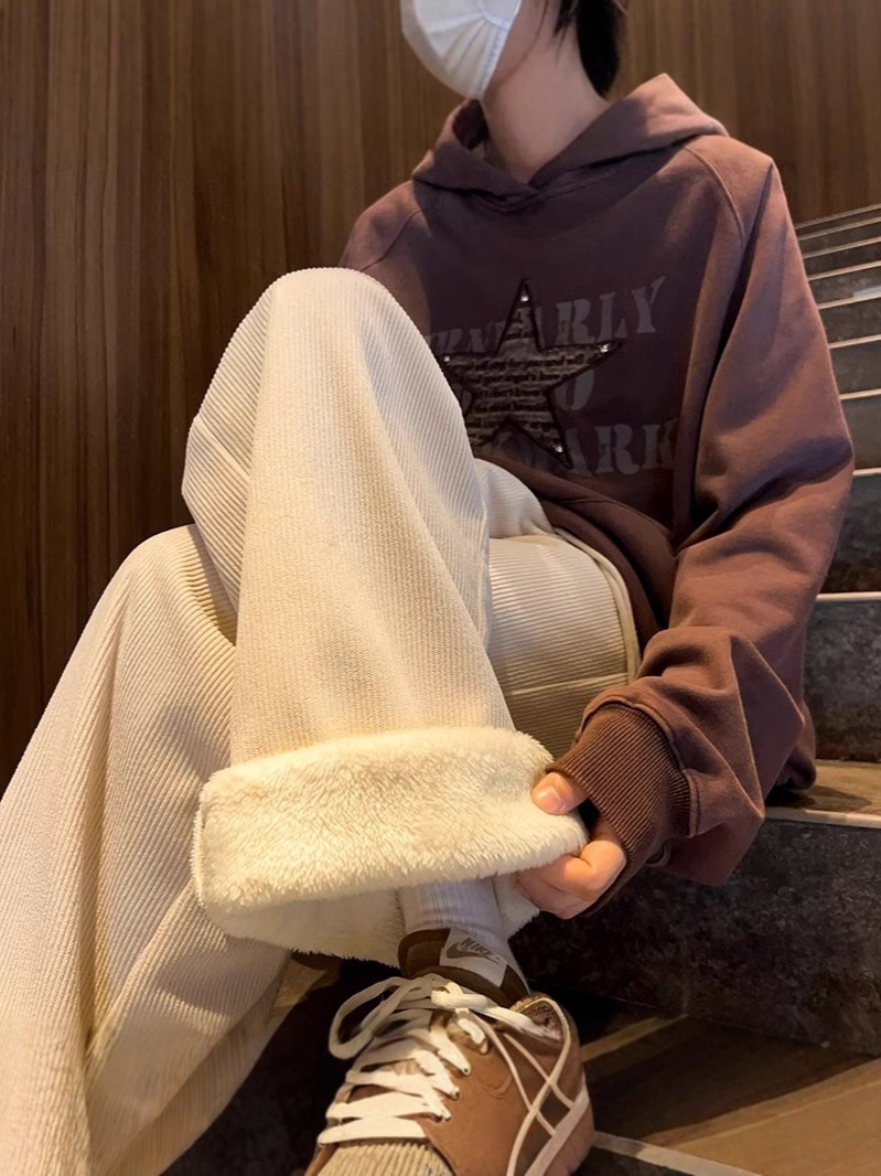 耐寒性零下40度のズボンの男性は冬に羊の小毛をつけます。