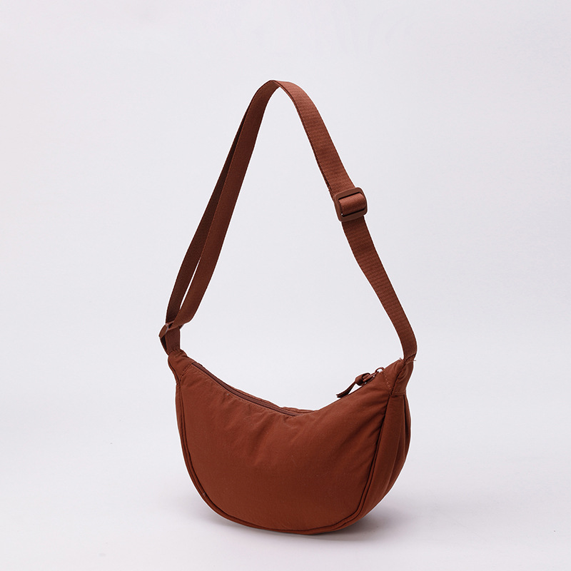 Bolso de tela pequeño bolso de moda ligero bolso de mochila de nylon transfronterizo mujer bolso de hombro casual versátil bolso de bolsas de bolsas de bollo de gran capacidad