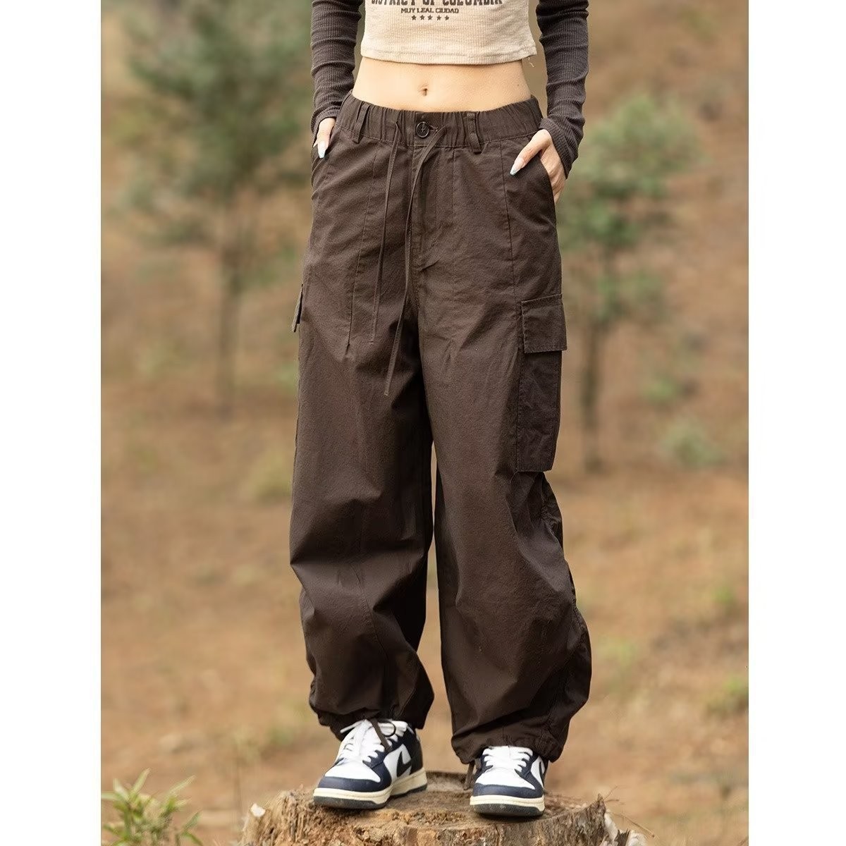 Estilo japonés americano al aire libre deportes delgados monopatín de pierna ancha los hombres y las mujeres con cordón ajustable suelta pantalones fregona