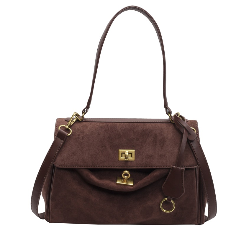 Este año, la popularidad de la bolsa de peluche retro, la capacidad de las mujeres, 2024 otoño y invierno, nueva moda, alta sensación de bolso de hombro.